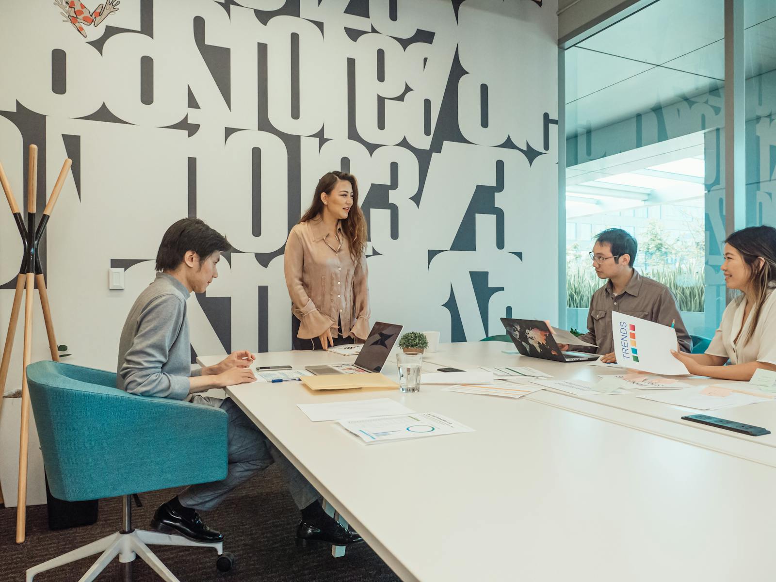 Team discussing business plans in a modern meeting room